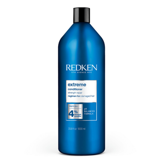 Redken Extreme Strength Repair Conditioner 1000ml professional strengthening conditioner for damaged hair helps reduce breakage detangle smooth strengthen weakened hair restore shine and improve manageability with amino acids arginine and citric acid.