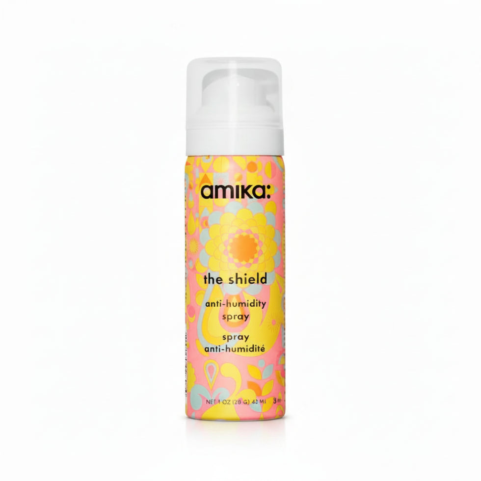 Amika The Shield Anti Humidity Hair Spray 30ml for frizz control and humidity protection**