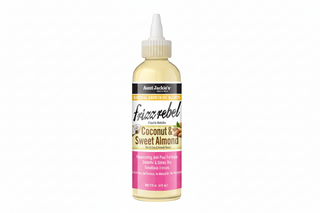 Aunt Jackie’s Frizz Rebel Coconut and Sweet Almond Growth Oil 4oz smoothing hair oil for shine frizz control and hair growth support.