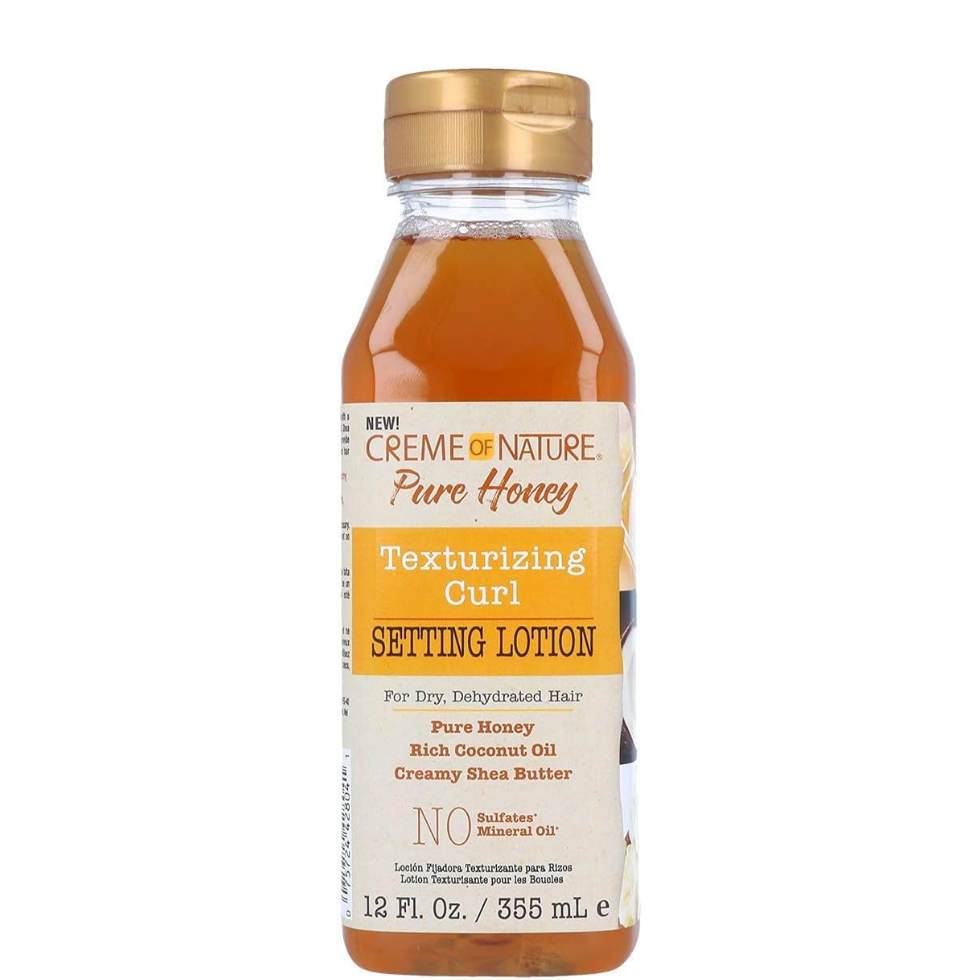 Creme Of Nature Pure Honey Texturizing Curl Setting Lotion defines curls, adds hold, and enhances shine while keeping hair soft and moisturized.