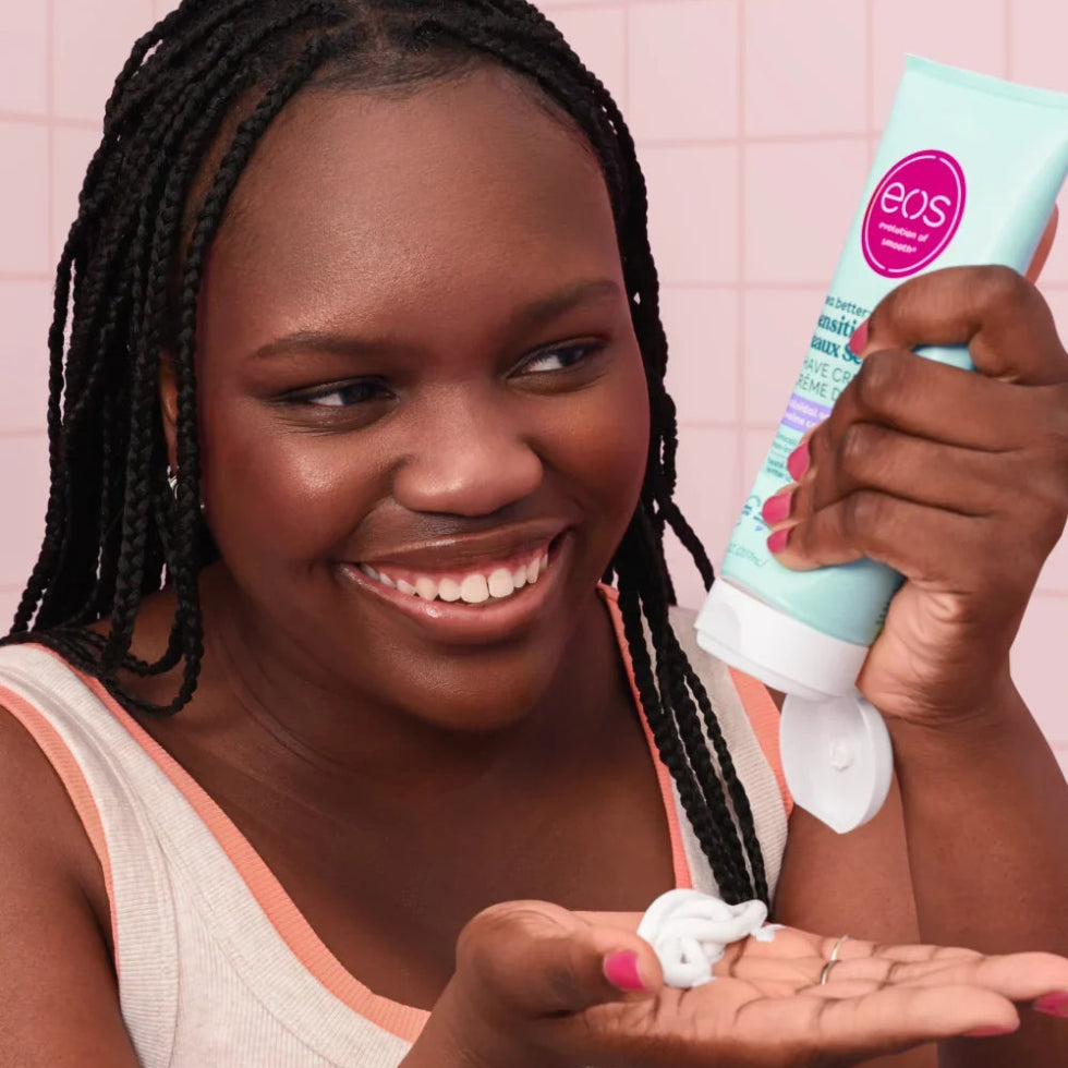 In-use application shot showing Eos Sensitive Shave Cream spread over the skin before shaving to support smooth razor glide and moisturised skin.