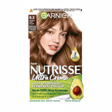 Garnier Nutrisse Ultra Color 6.3 Golden Light Brown hair dye box showing warm golden light brown shade result