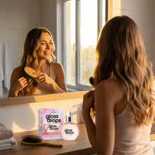 Hair Chemist Gloss Drops Anti-Frizz Hair Oil applied to braids, adding shine and smoothing flyaways.