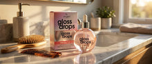 Hair styled smooth and glossy after applying Hair Chemist Gloss Drops Anti-Frizz Hair Oil.