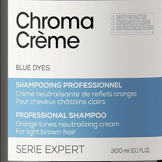 L’Oréal Professionnel Chroma Crème Blue Shampoo 300ml for light to medium brown hair, neutralizing orange tones and enhancing brunette color vibrancy.
