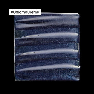 L’Oréal Professionnel Chroma Crème Blue Shampoo 300ml for light to medium brown hair, neutralizing orange tones and enhancing brunette color vibrancy.