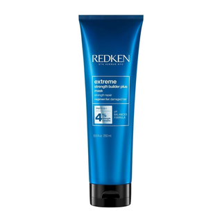 Redken Extreme Strength Builder Treatment 250ml deep conditioning hair treatment for damaged hair strengthens weak strands repairs breakage improves softness smoothness and overall hair resilience and shine