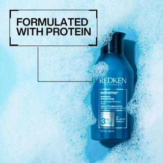Redken Extreme Strength Repair Shampoo 1000ml professional strengthening shampoo for damaged hair helps cleanse repair reduce breakage restore shine improve smoothness and strengthen weakened hair fibres with amino acids and arginine.