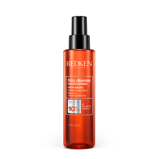 Redken Frizz Dismiss Instant Deflate 125ml anti frizz smoothing serum helps control volume reduce flyaways add shine improve manageability and protect hair from heat styling and humidity for smoother hair results