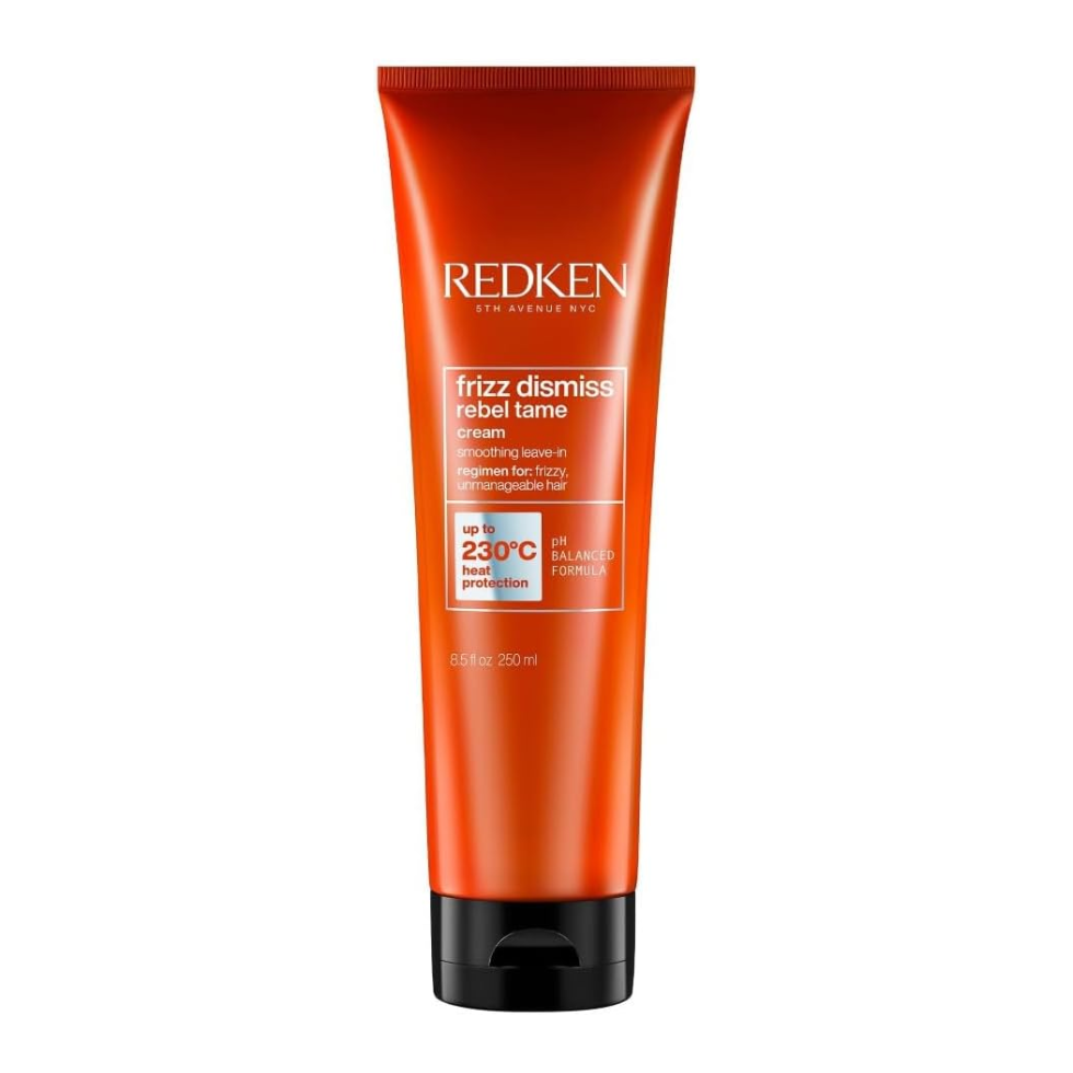 Redken Frizz Dismiss Rebel Tame 250ml heat protection smoothing cream with Babassu oil helps tame frizz hydrate hair improve manageability add shine and protect hair during styling for smooth polished results