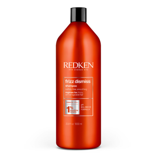 Redken Frizz Dismiss Shampoo 1000ml anti frizz smoothing shampoo with Babassu oil gently cleanses hair controls frizz boosts shine improves softness and helps protect against humidity for all hair types and textures