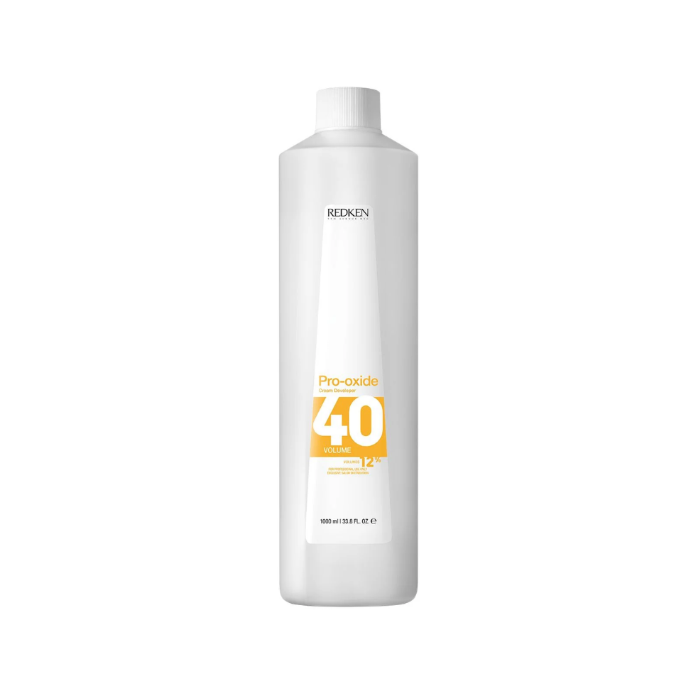 Redken Pro-Oxide Cream Developer 40 Vol 12% 1000ml professional cream developer for hair colouring and lightening services provides smooth mixing predictable performance and consistent salon-quality results.