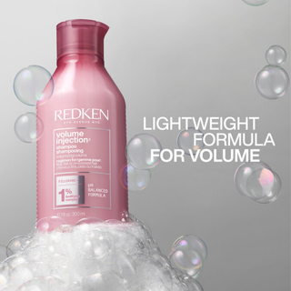 Redken Volume Injection Shampoo 300ml lightweight volumising shampoo with Filloxane gently cleanses removes excess oil adds body root lift fullness shine and movement to fine flat and limp hair for thicker looking results