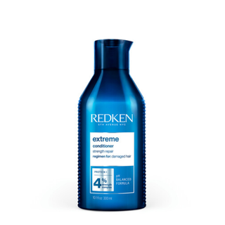 redken extreme strength repair conditioner 300ml fortifying conditioner for damaged hair helps strengthen strands reduce breakage improve detangling restore shine and support healthier more resilient hair